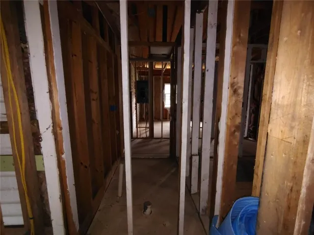 a room with gym equipment and a window