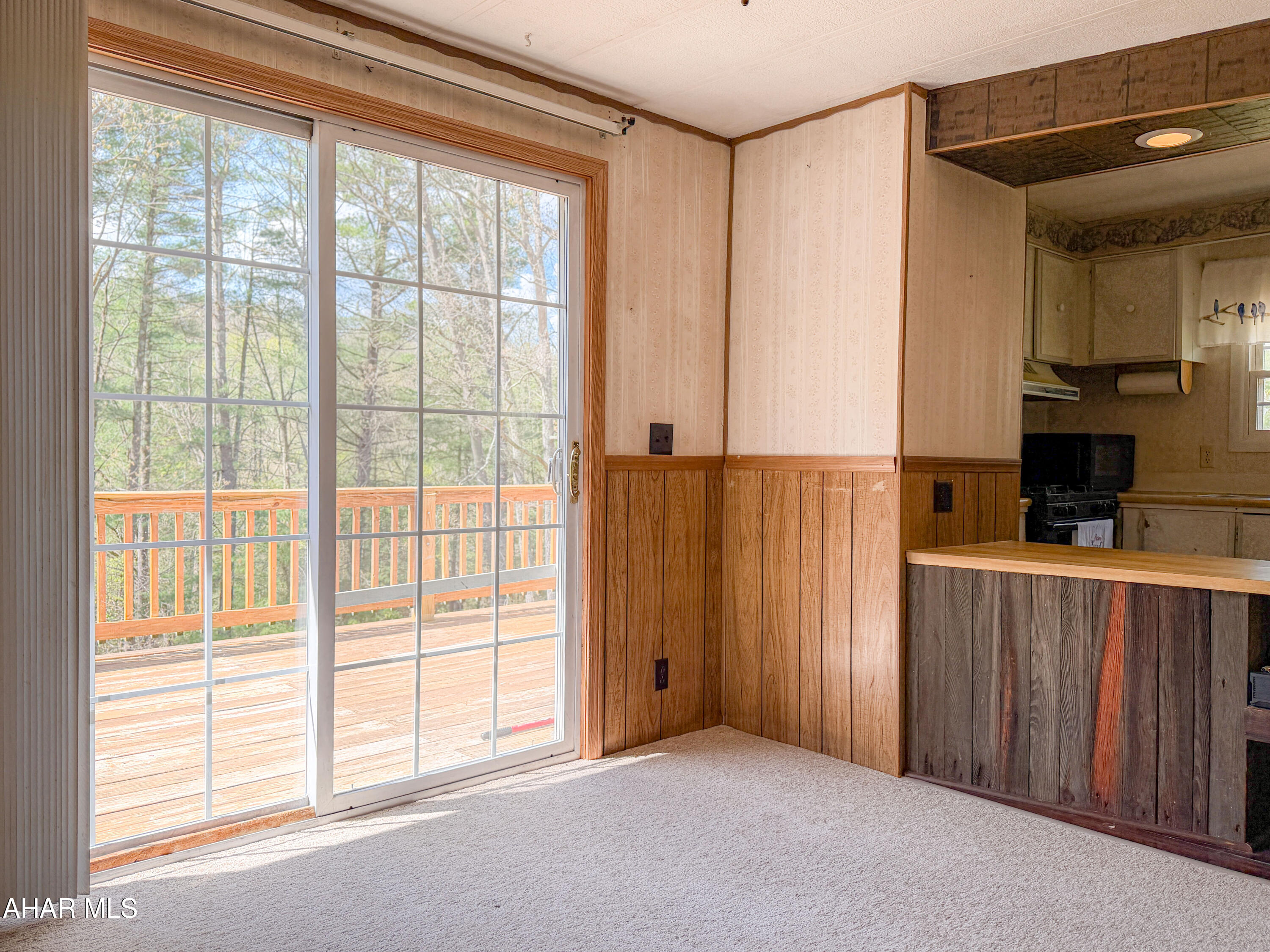 151 Pine Echo Road Everett, PA 15537 - Photo 24 of 51 a view of a kitchen with an empty space and a window