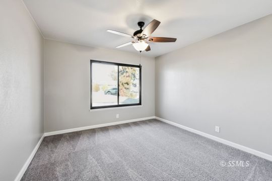 320 Dawn Court Ridgecrest, CA 93555 - Photo 17 of 24 a view of an empty room with a window