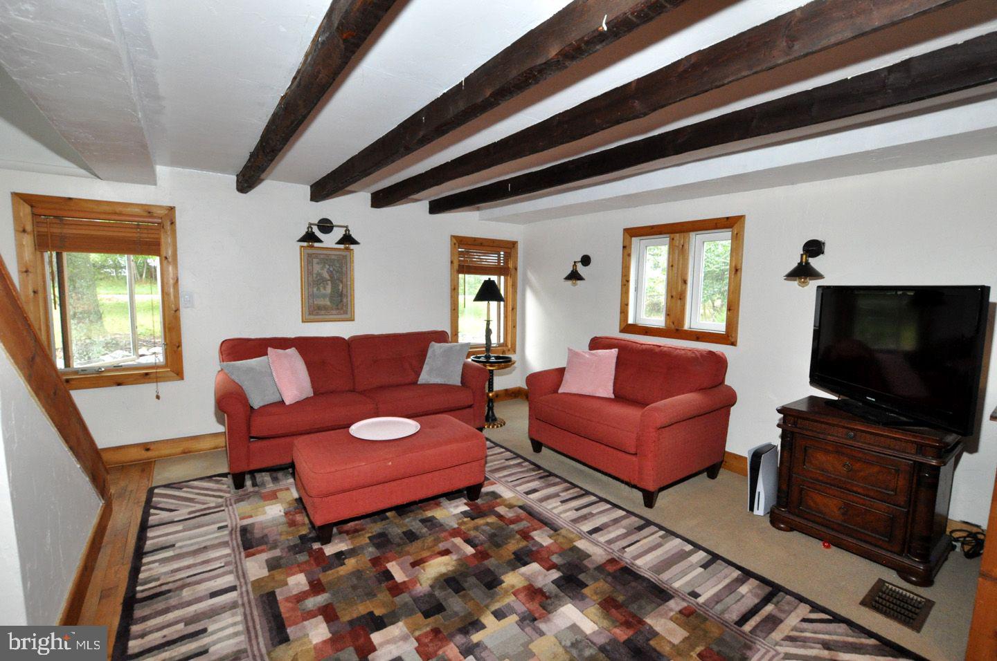 108 Patty Bowker Road Tabernacle, NJ 08088 - Photo 15 of 32 Living room with beamed ceiling