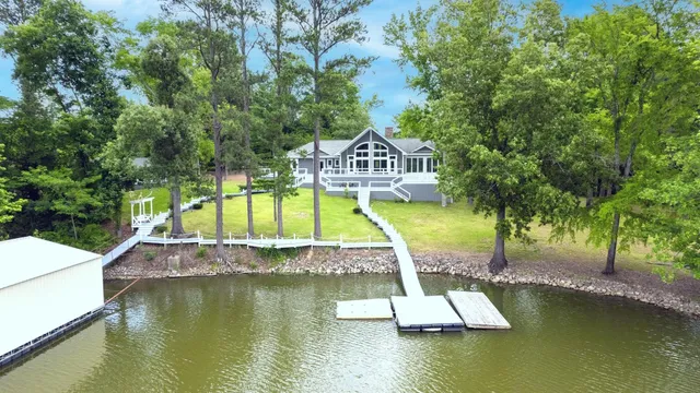 a view of a swimming pool with lounge chairs