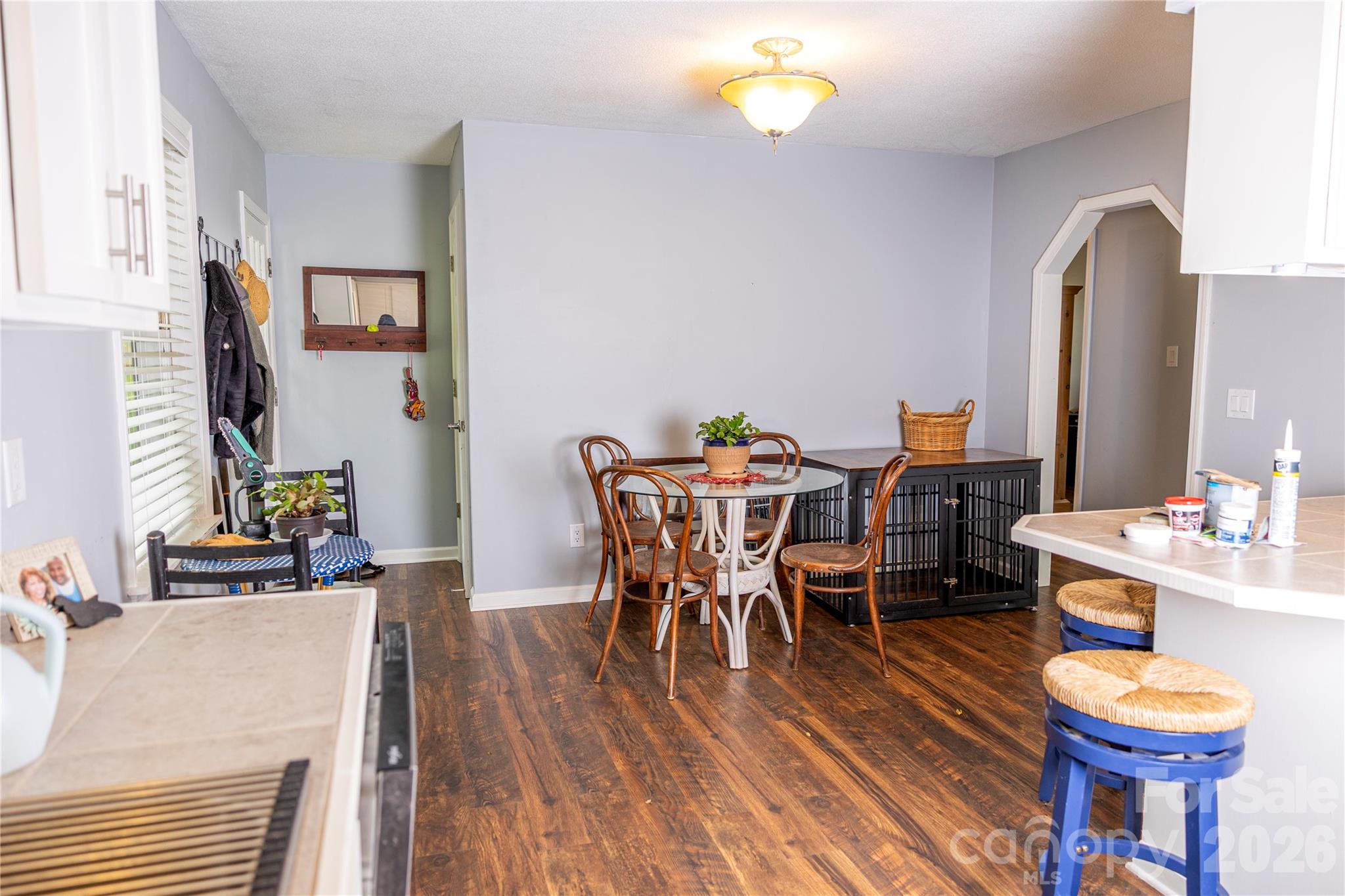 57 Gribble Road Franklin, NC 28734 - Photo 14 of 39 a view of a dining room with furniture and wooden floor