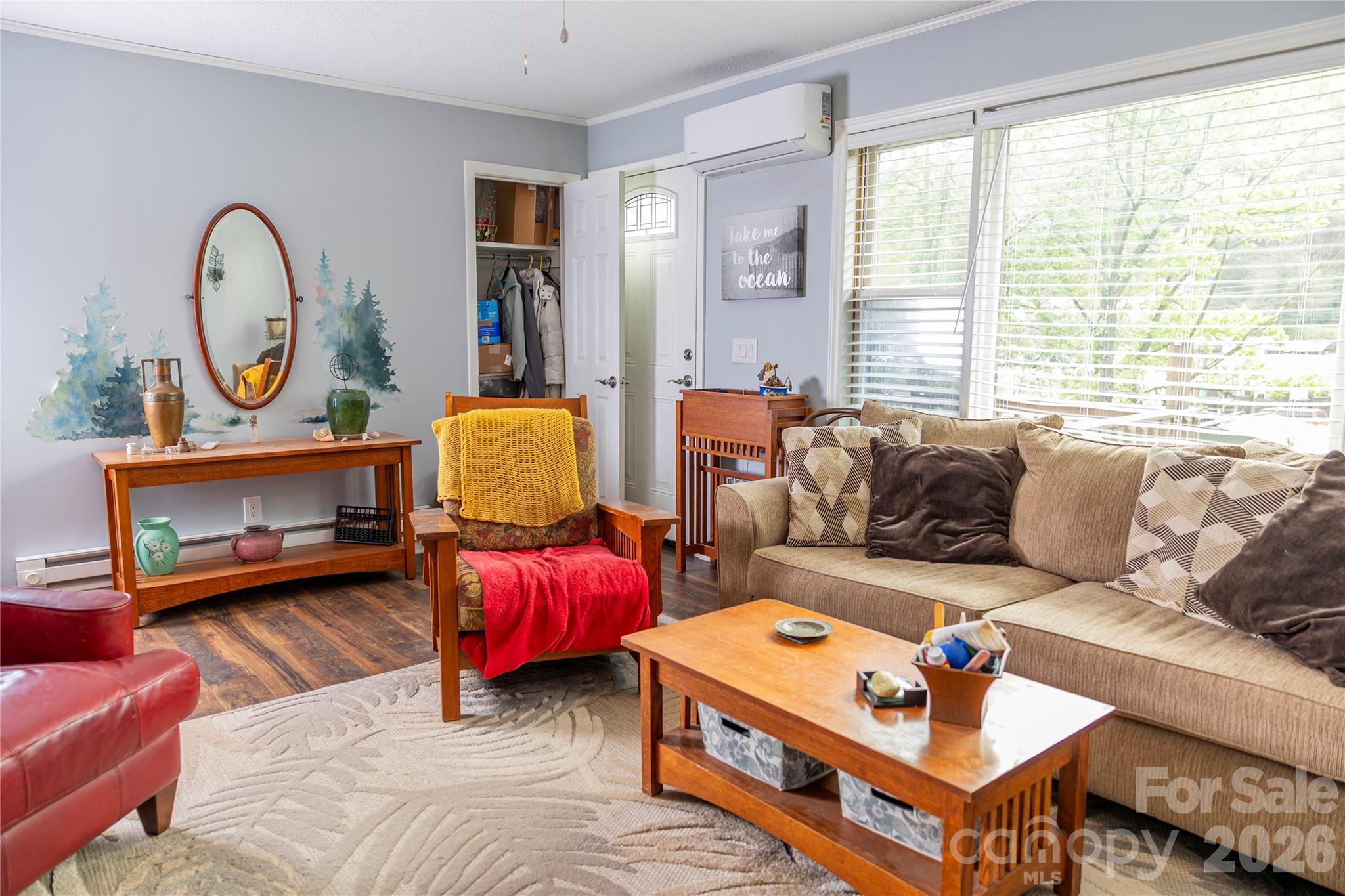 57 Gribble Road Franklin, NC 28734 - Photo 18 of 39 a living room with furniture a rug and a window