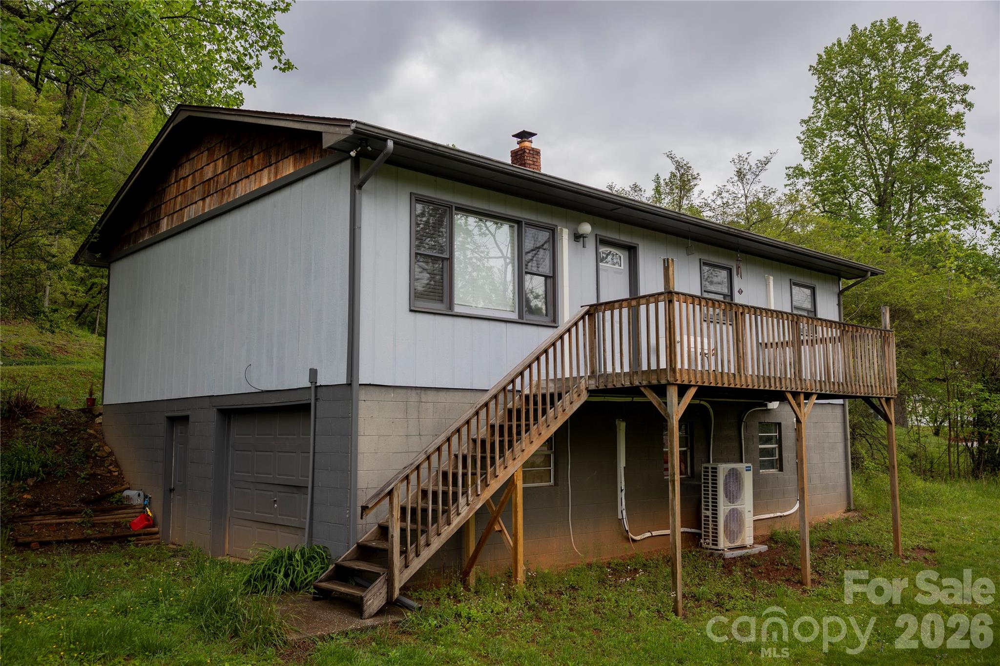 57 Gribble Road Franklin, NC 28734 - Photo 2 of 39 a view of a house with a yard next to a yard