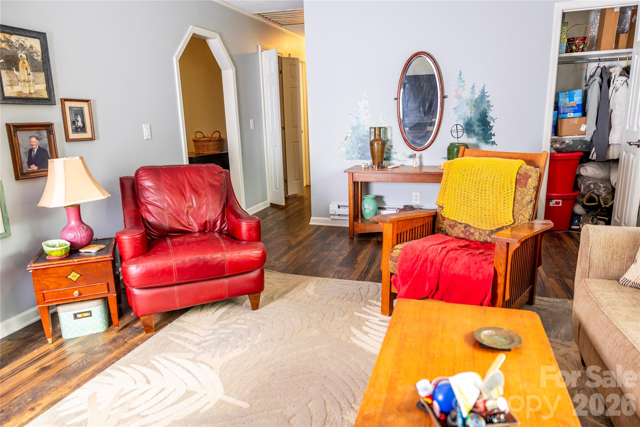 57 Gribble Road Franklin, NC 28734 - Photo 21 of 39 a living room with furniture a rug and a floor to ceiling window