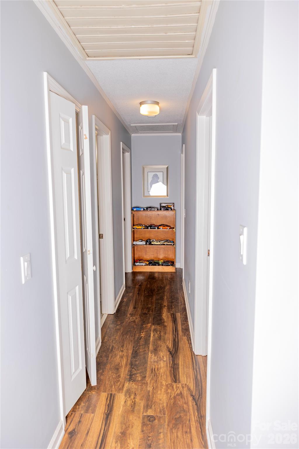 57 Gribble Road Franklin, NC 28734 - Photo 23 of 39 a view of a hallway with wooden floor and furniture
