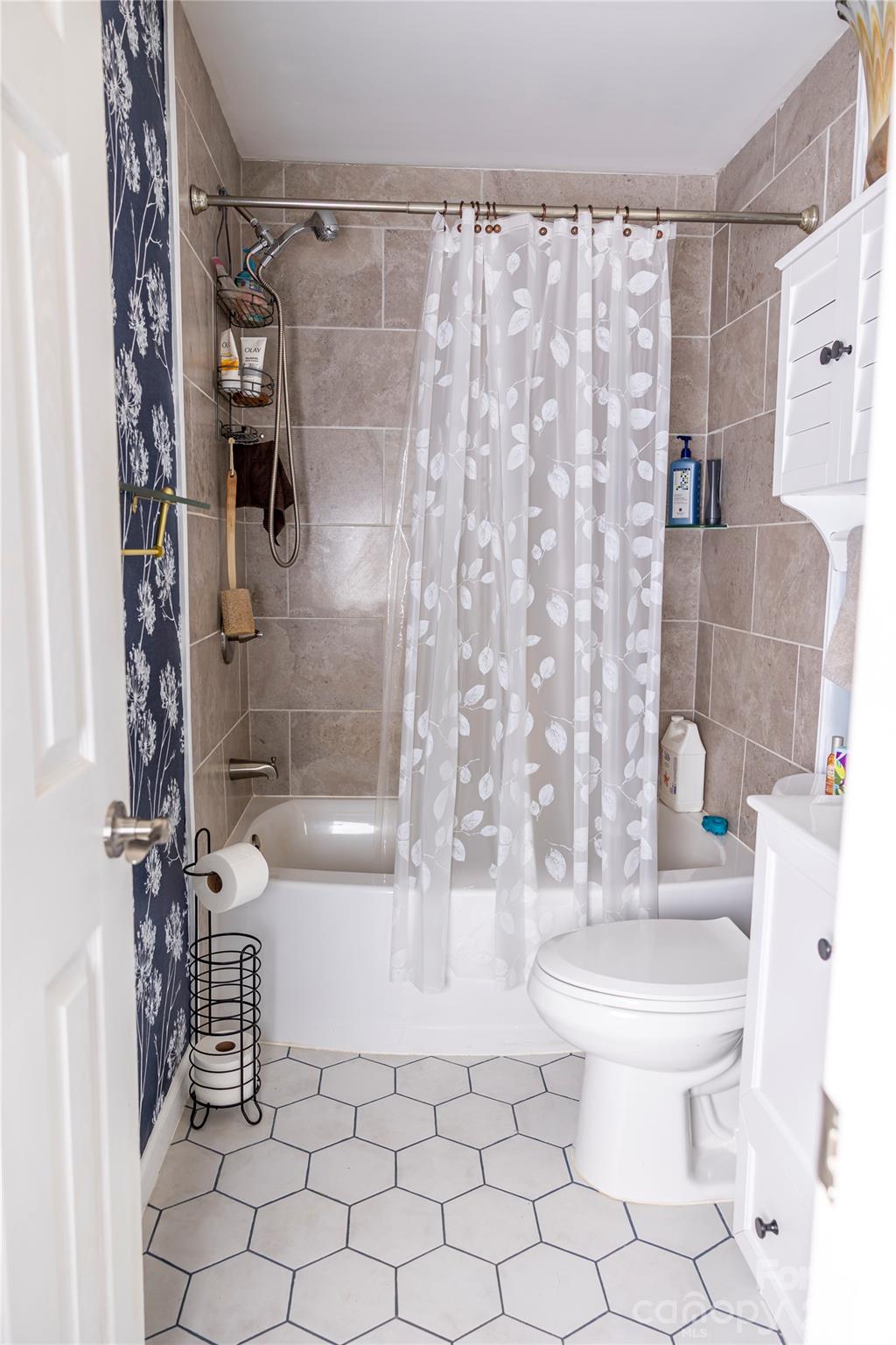 57 Gribble Road Franklin, NC 28734 - Photo 24 of 39 a bathroom with a toilet and a shower