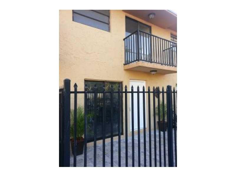 6345 Southwest 138th Court, Unit 102 Miami, FL 33183 - Photo 2 of 6 a view of a black and white wall