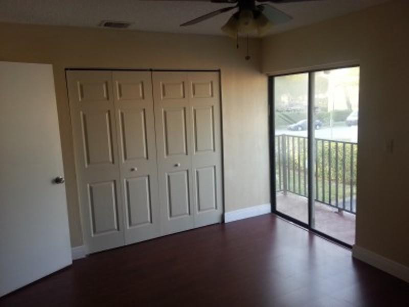 6345 Southwest 138th Court, Unit 102 Miami, FL 33183 - Photo 6 of 6 a view of entryway with wooden floor