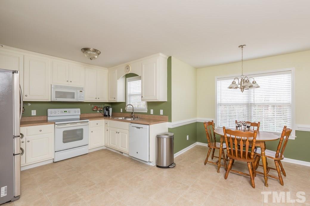 552 Axum Road Willow Spring, NC 27592 - Photo 3 of 25 The kitchen is bright and open!