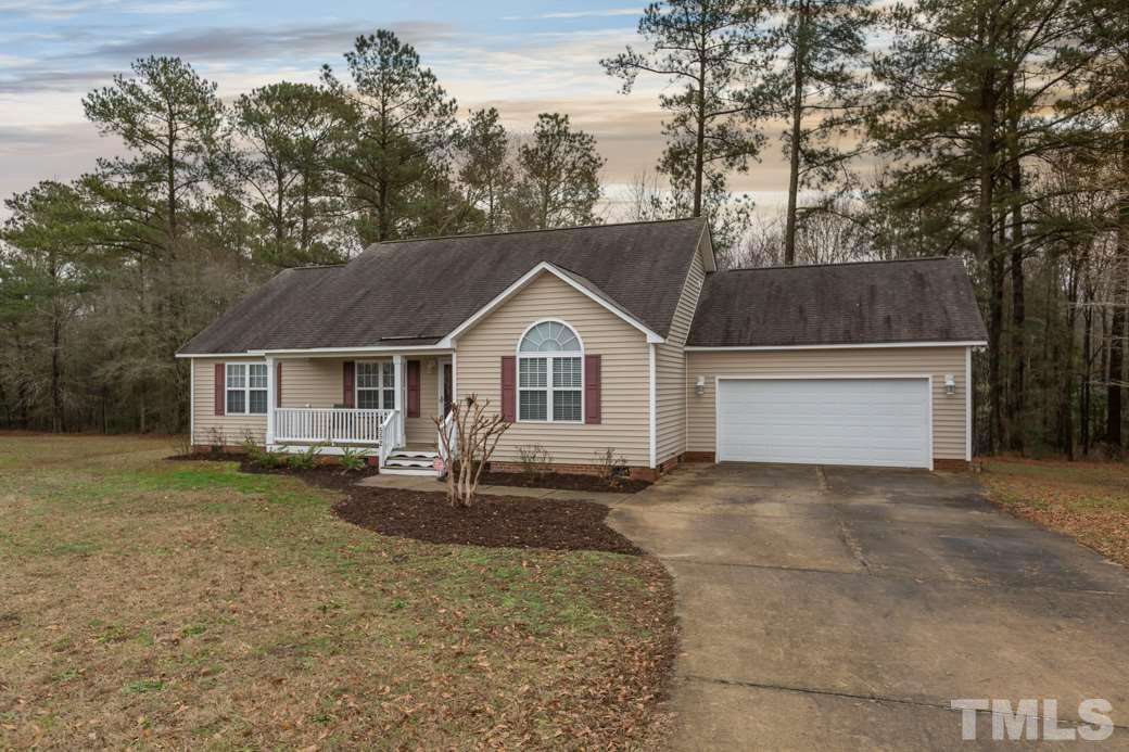552 Axum Road Willow Spring, NC 27592 - Photo 22 of 25 The long driveway can accommodate as many cars as you'd like!