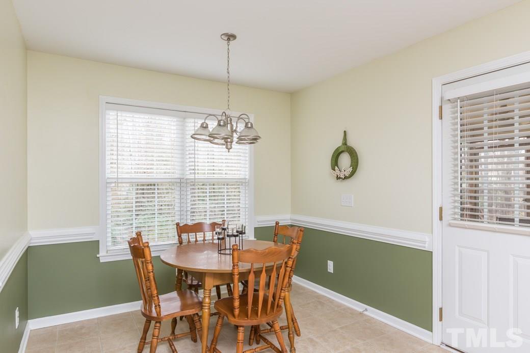 552 Axum Road Willow Spring, NC 27592 - Photo 9 of 25 Sunshine pours in to brighten meal times!