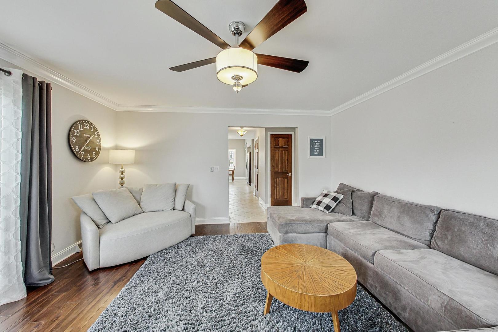 1345 East Bailey Road Naperville, IL 60565 - Photo 15 of 49 a living room with furniture and a table