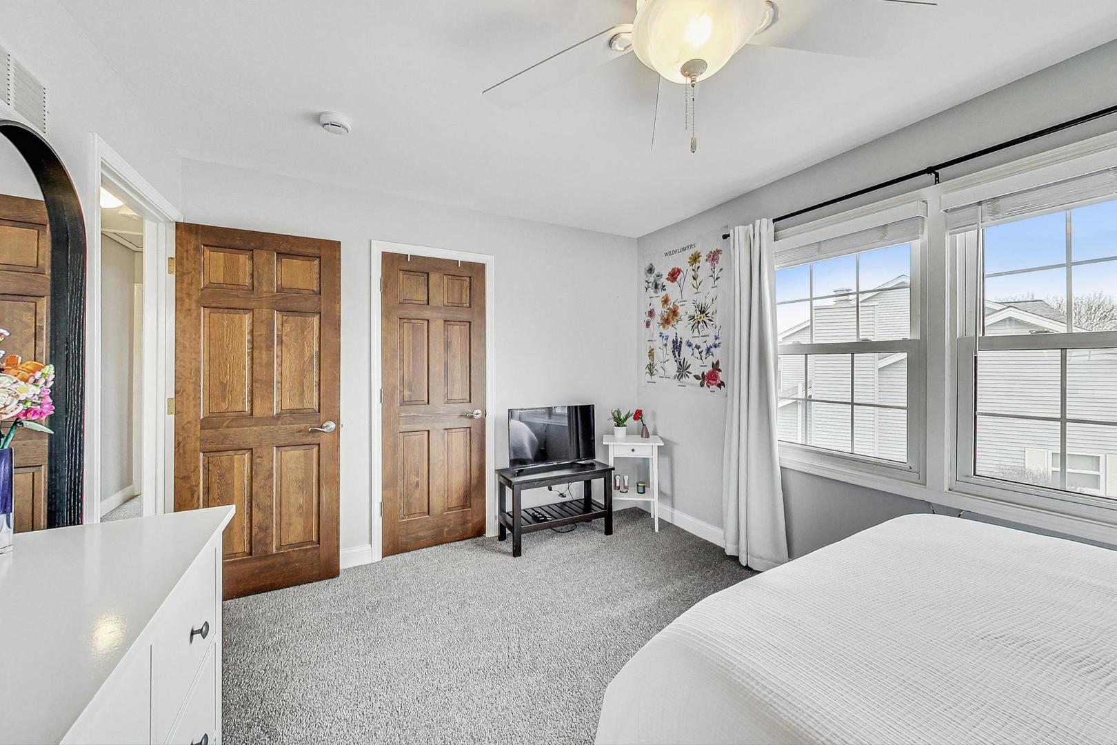 1345 East Bailey Road Naperville, IL 60565 - Photo 24 of 49 a bedroom with a bed and a window