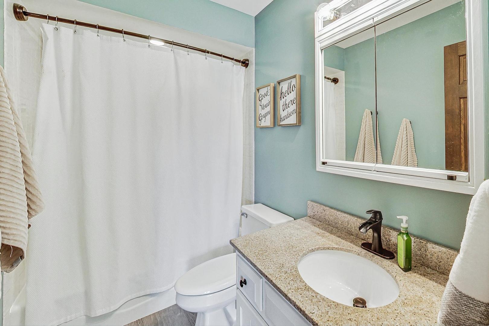 1345 East Bailey Road Naperville, IL 60565 - Photo 29 of 49 a bathroom with a granite countertop sink and a mirror