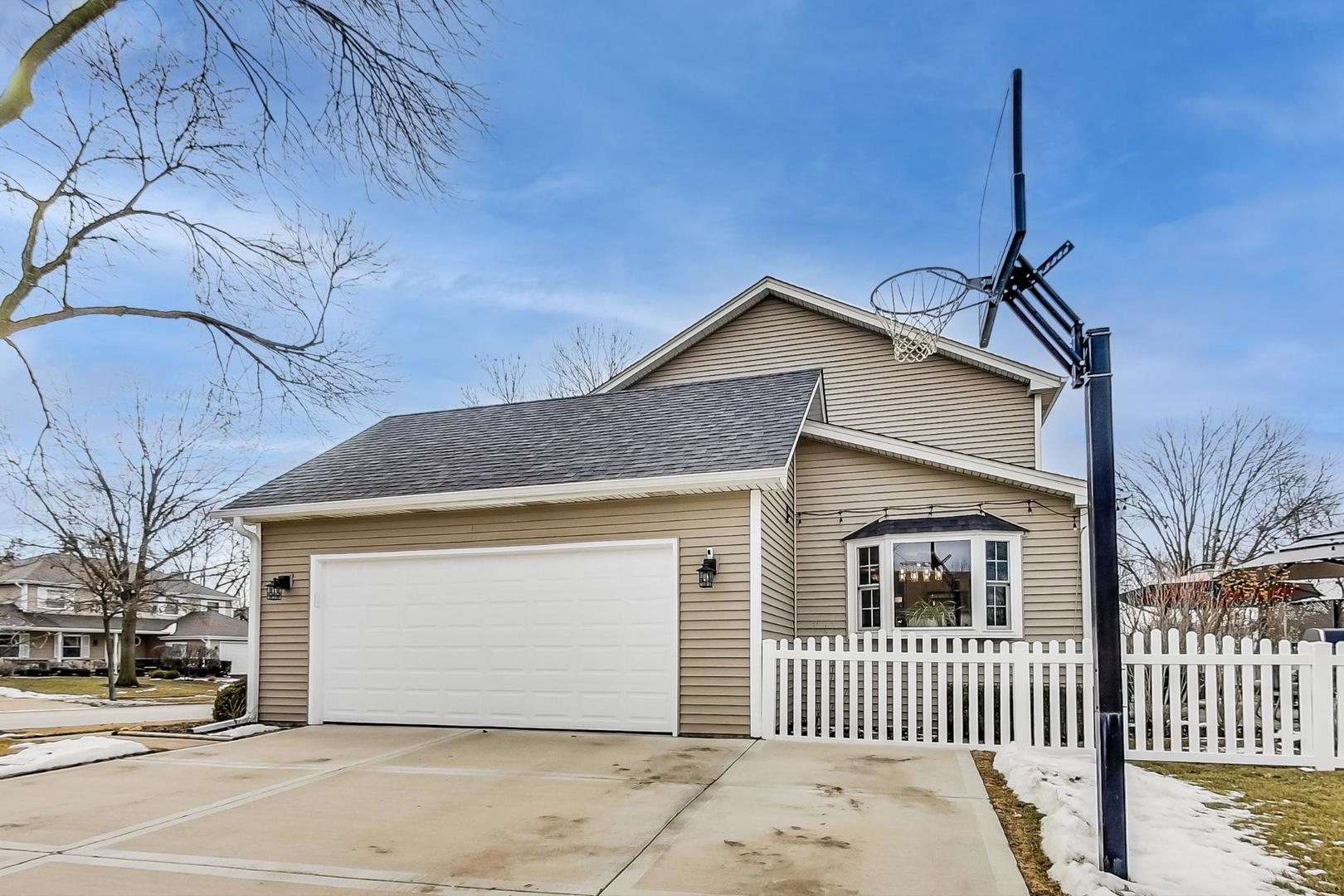 1345 East Bailey Road Naperville, IL 60565 - Photo 44 of 49 a front view of a house with a yard