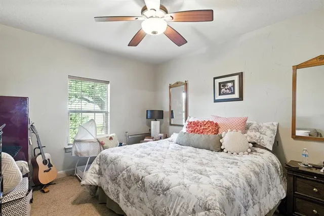 a view of park with a road