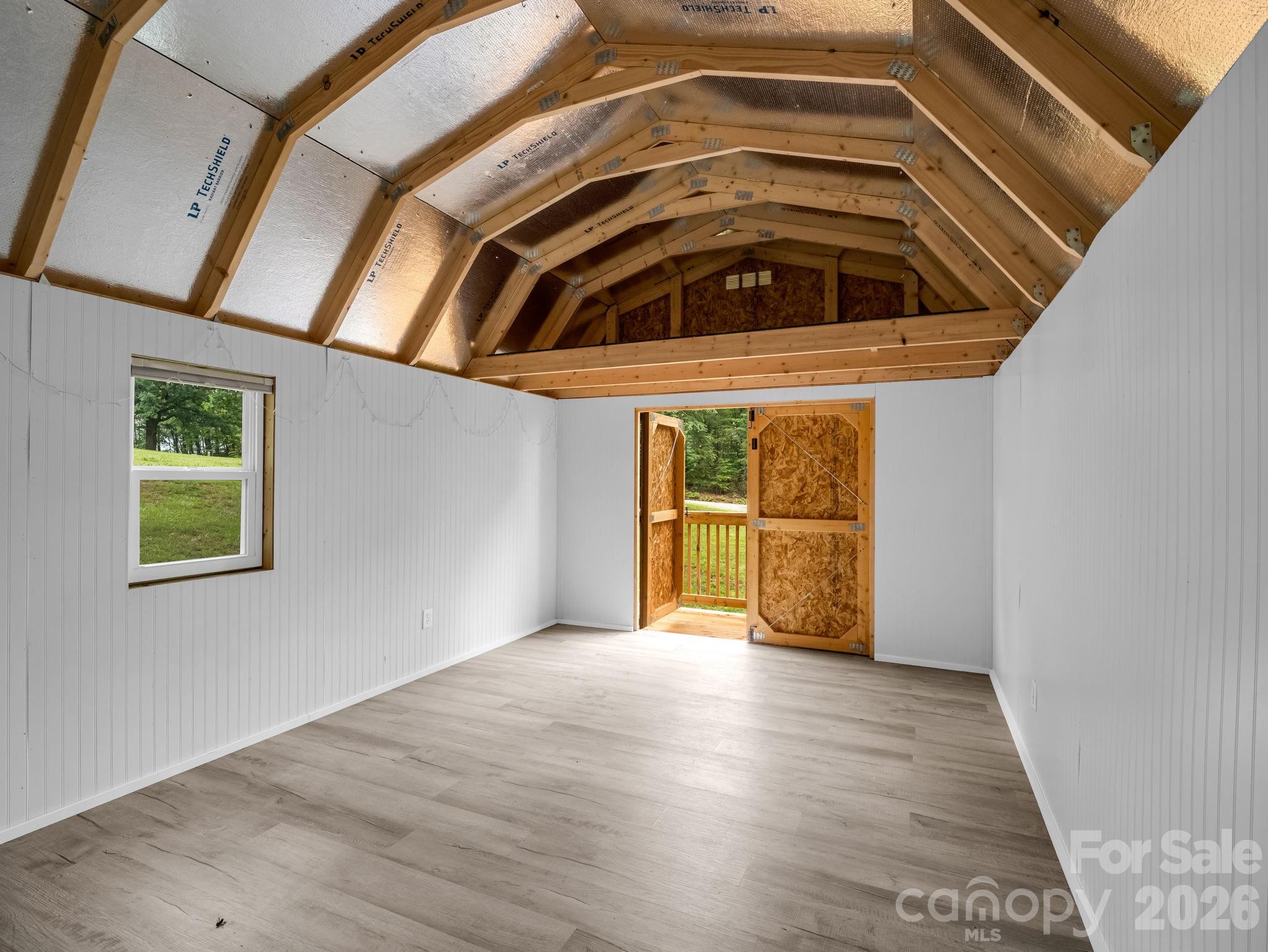 1449 Toney Road Bostic, NC 28018 - Photo 36 of 43 a view of a hallway with wooden floor and a cabinet