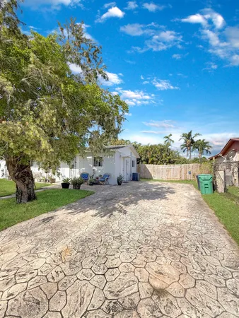 a street view with a yard