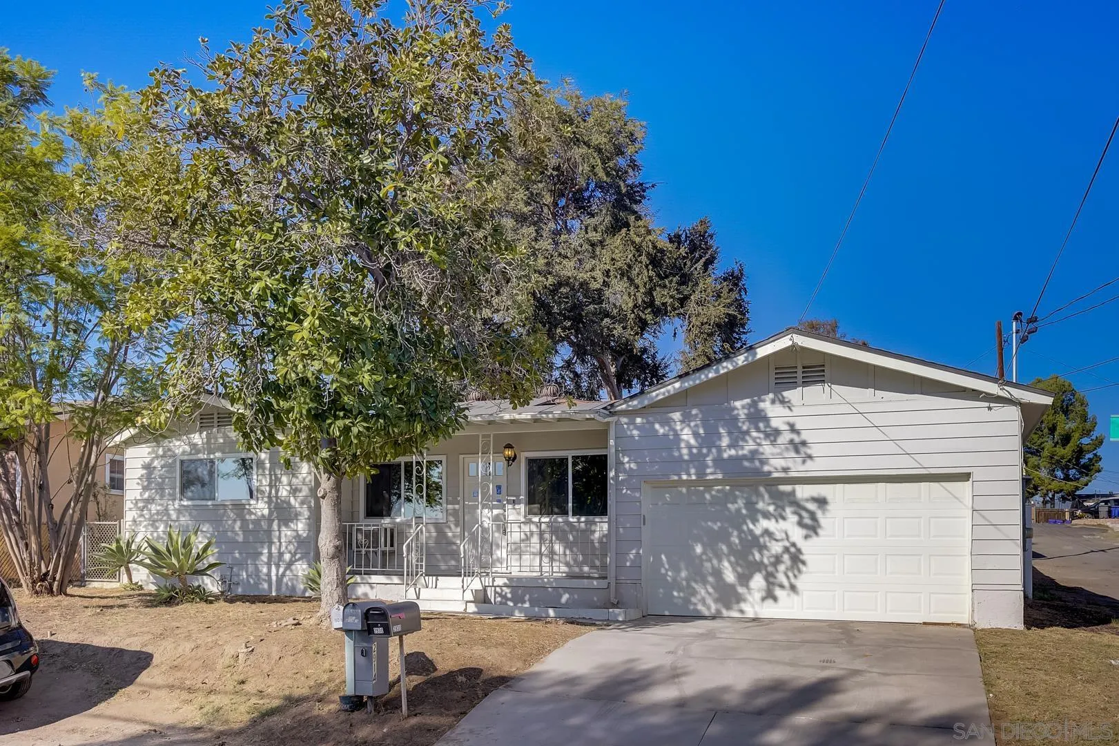 9060 Rosedale Drive Spring Valley, CA 91977 - Photo 1 of 28 a front view of a house with a yard