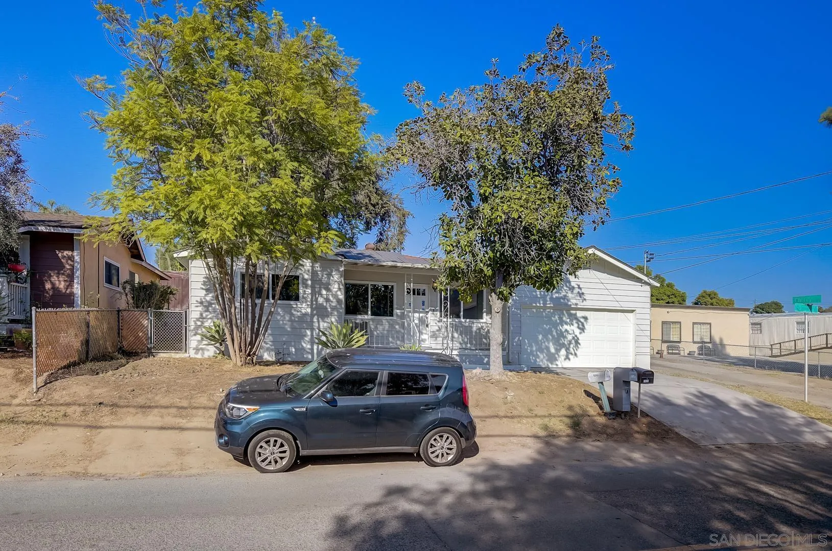 9060 Rosedale Drive Spring Valley, CA 91977 - Photo 11 of 28 a car parked in front of a house