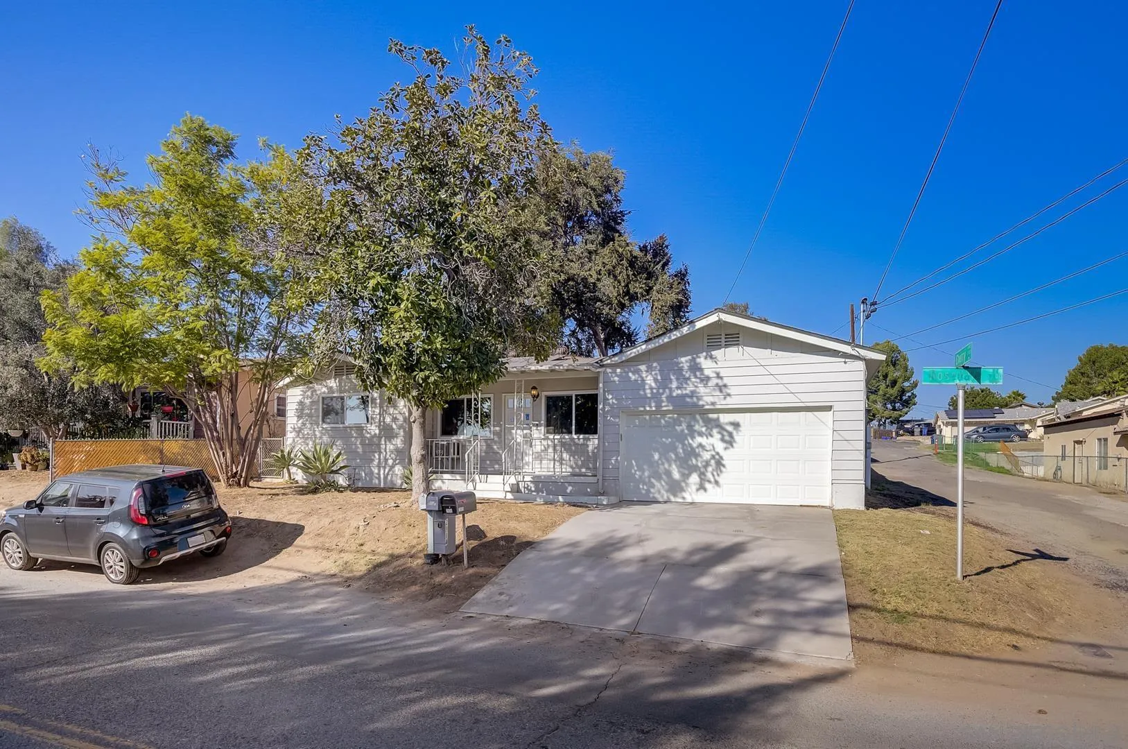 9060 Rosedale Drive Spring Valley, CA 91977 - Photo 13 of 28 a view of a street with parked cars