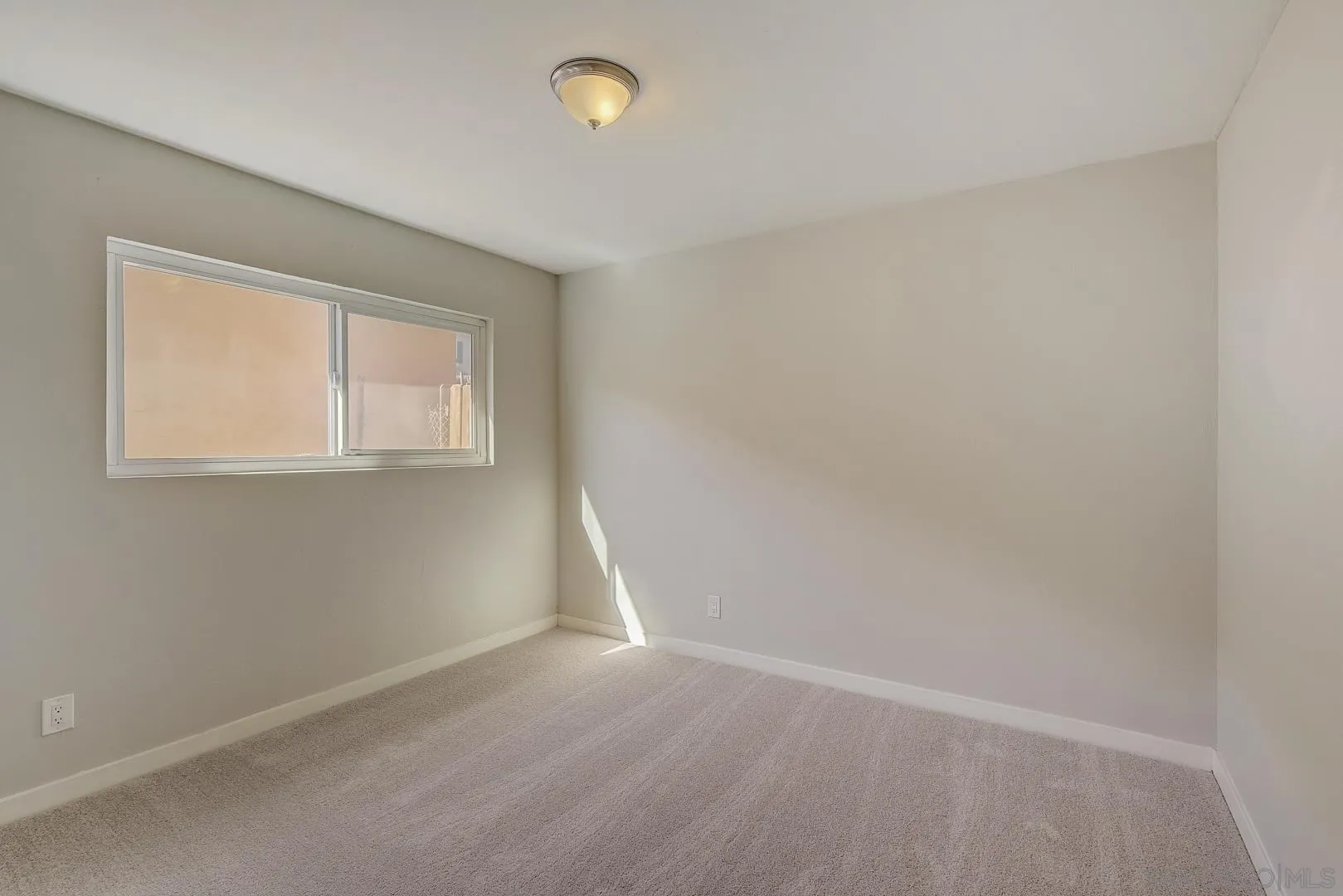 9060 Rosedale Drive Spring Valley, CA 91977 - Photo 21 of 28 an empty room with a window