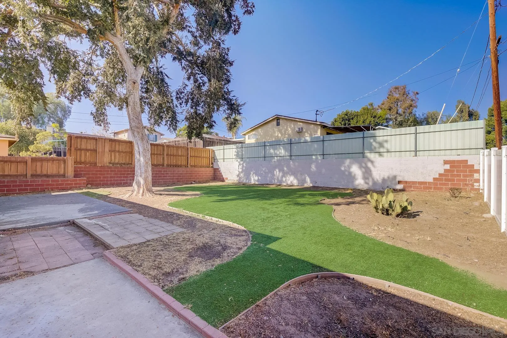 9060 Rosedale Drive Spring Valley, CA 91977 - Photo 28 of 28 a view of a house with a yard