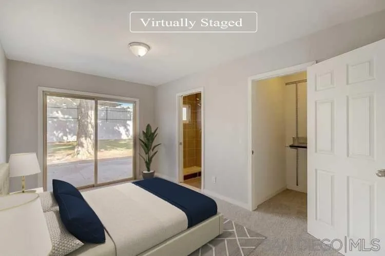 9060 Rosedale Drive Spring Valley, CA 91977 - Photo 3 of 28 a bedroom with a bed and large window