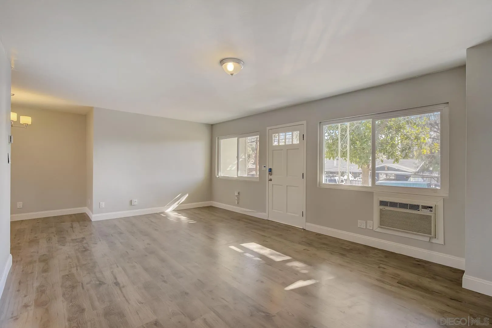 9060 Rosedale Drive Spring Valley, CA 91977 - Photo 6 of 28 a view of an empty room with a window