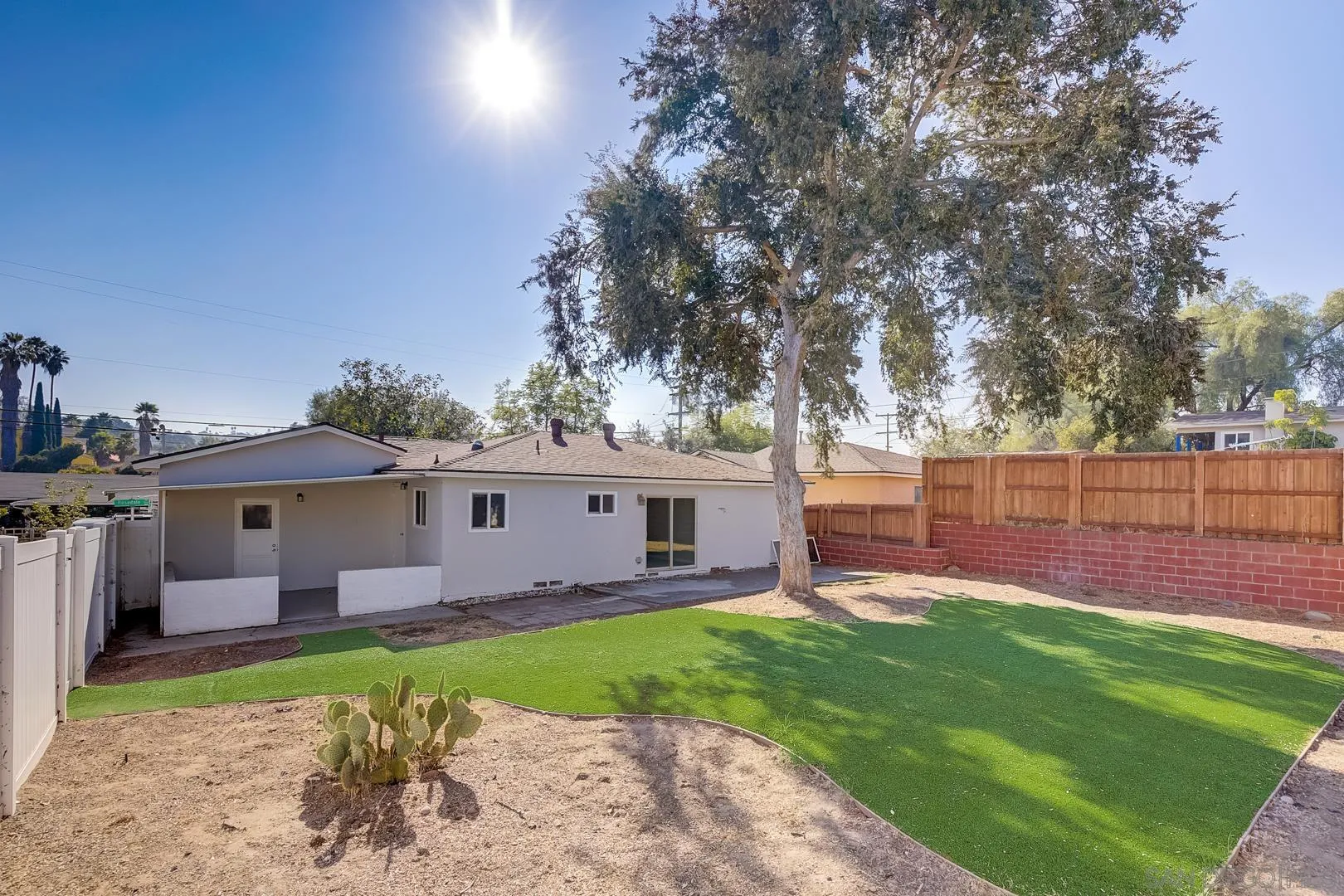 9060 Rosedale Drive Spring Valley, CA 91977 - Photo 9 of 28 a front view of a house with garden