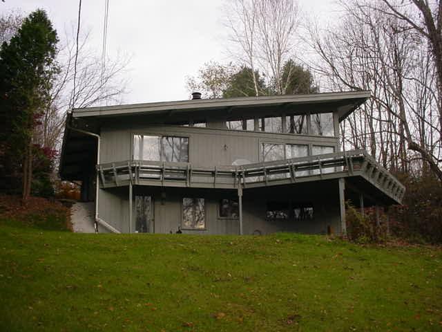 14 Averic Road Stockbridge, MA 01266 - Photo 1 of 16 a front view of a house with balcony