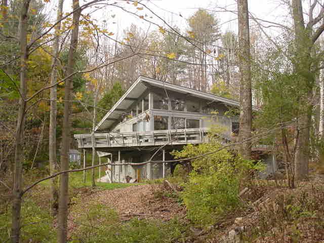 14 Averic Road Stockbridge, MA 01266 - Photo 2 of 16 a house with trees in the background