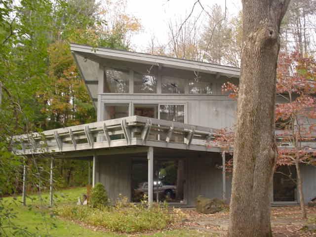 14 Averic Road Stockbridge, MA 01266 - Photo 3 of 16 a view of a house with a balcony and balcony