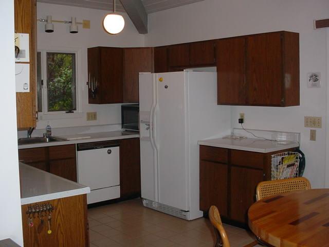 14 Averic Road Stockbridge, MA 01266 - Photo 7 of 16 a kitchen with stainless steel appliances granite countertop a refrigerator and a stove top oven