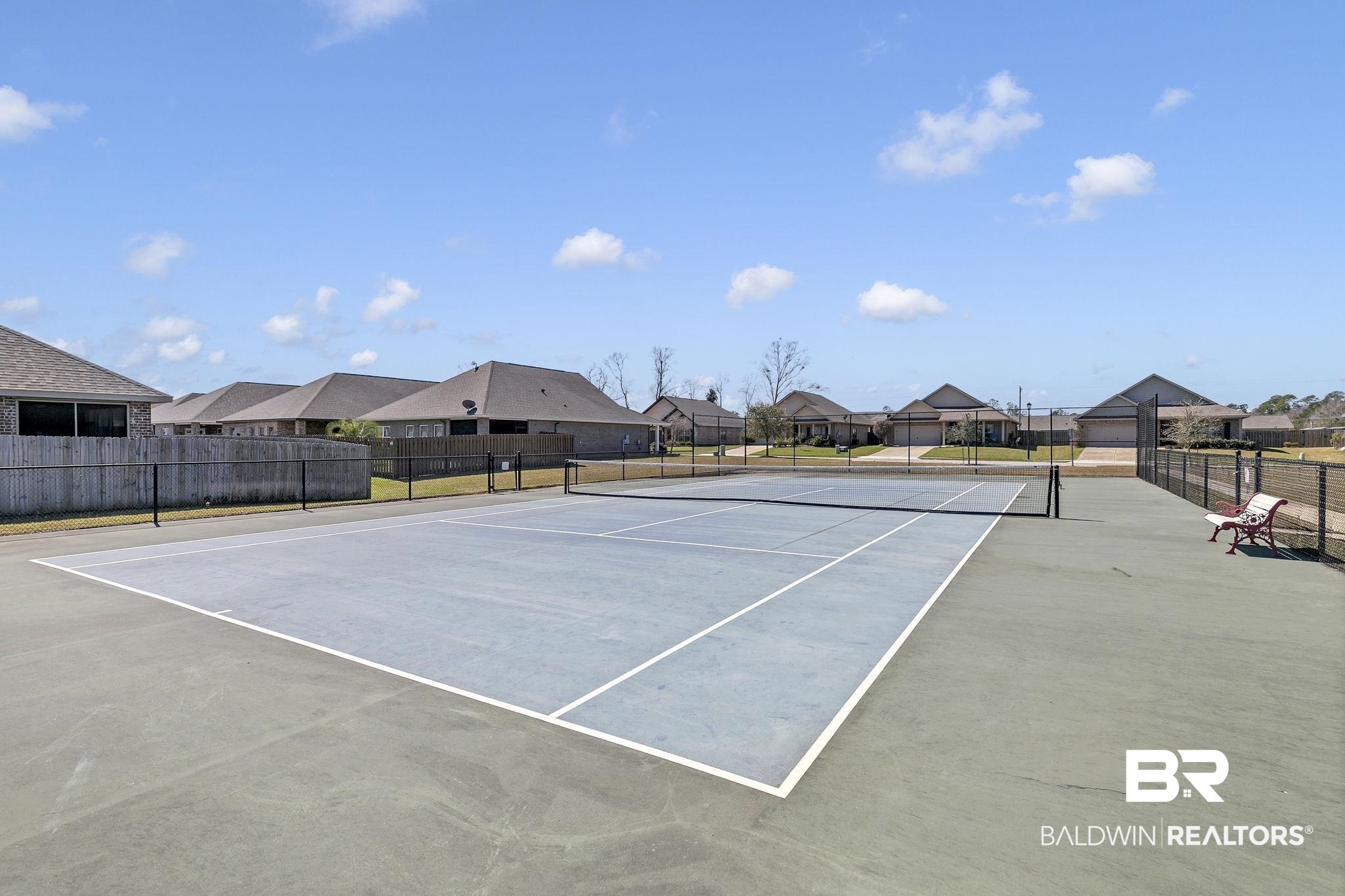 1547 Kairos Loop Foley, AL 36535 - Photo 52 of 55 View of sport court featuring fence and a residential view