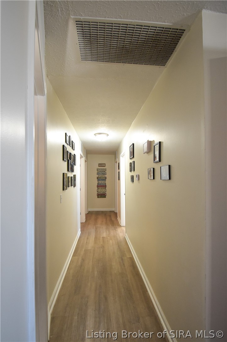 2481 North Slab Road Scottsburg, IN 47170 - Photo 15 of 34 Extra wide hallway. Would fit walker or small wheelchair.