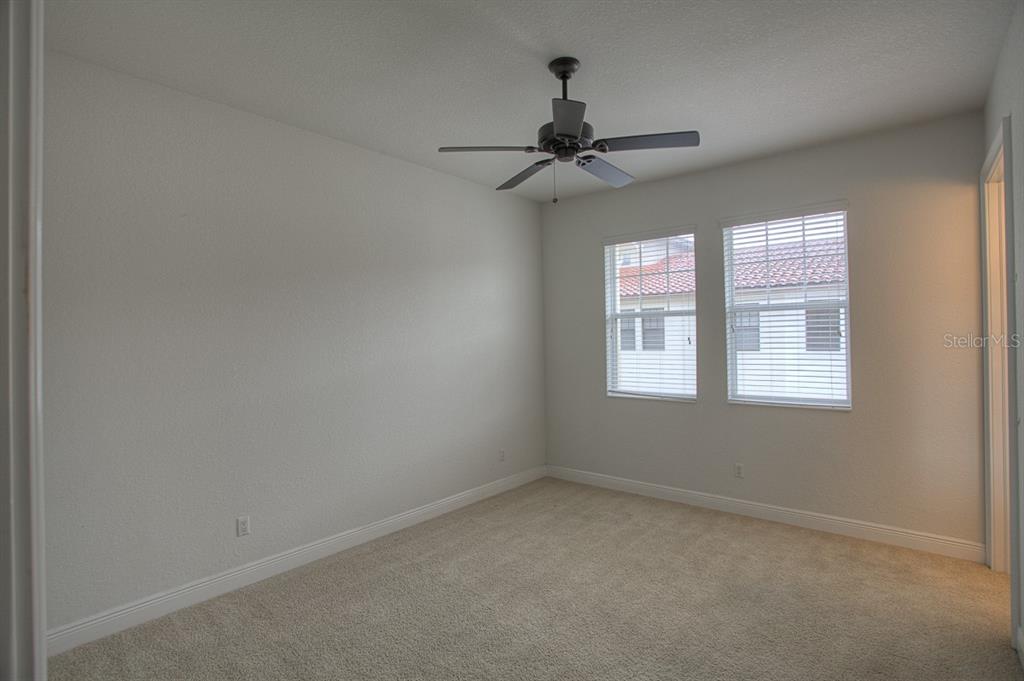 6021 Printery Street, Unit 106 Tampa, FL 33616 - Photo 19 of 23 a view of an empty room with a window
