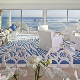 a very nice looking dining room with a large window