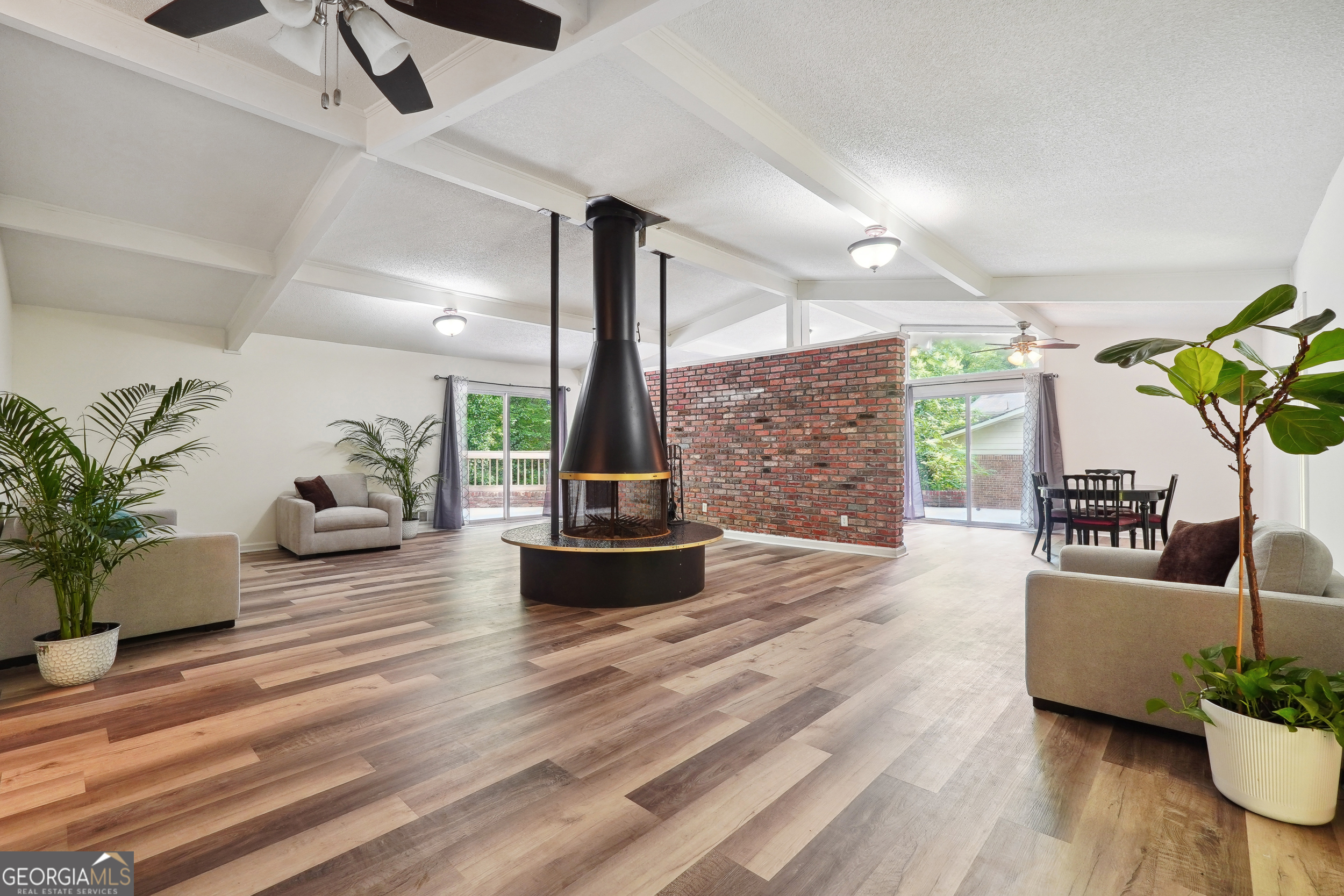 3439 Boring Road Decatur, GA 30034 - Photo 1 of 1 a living room with furniture and a potted plant