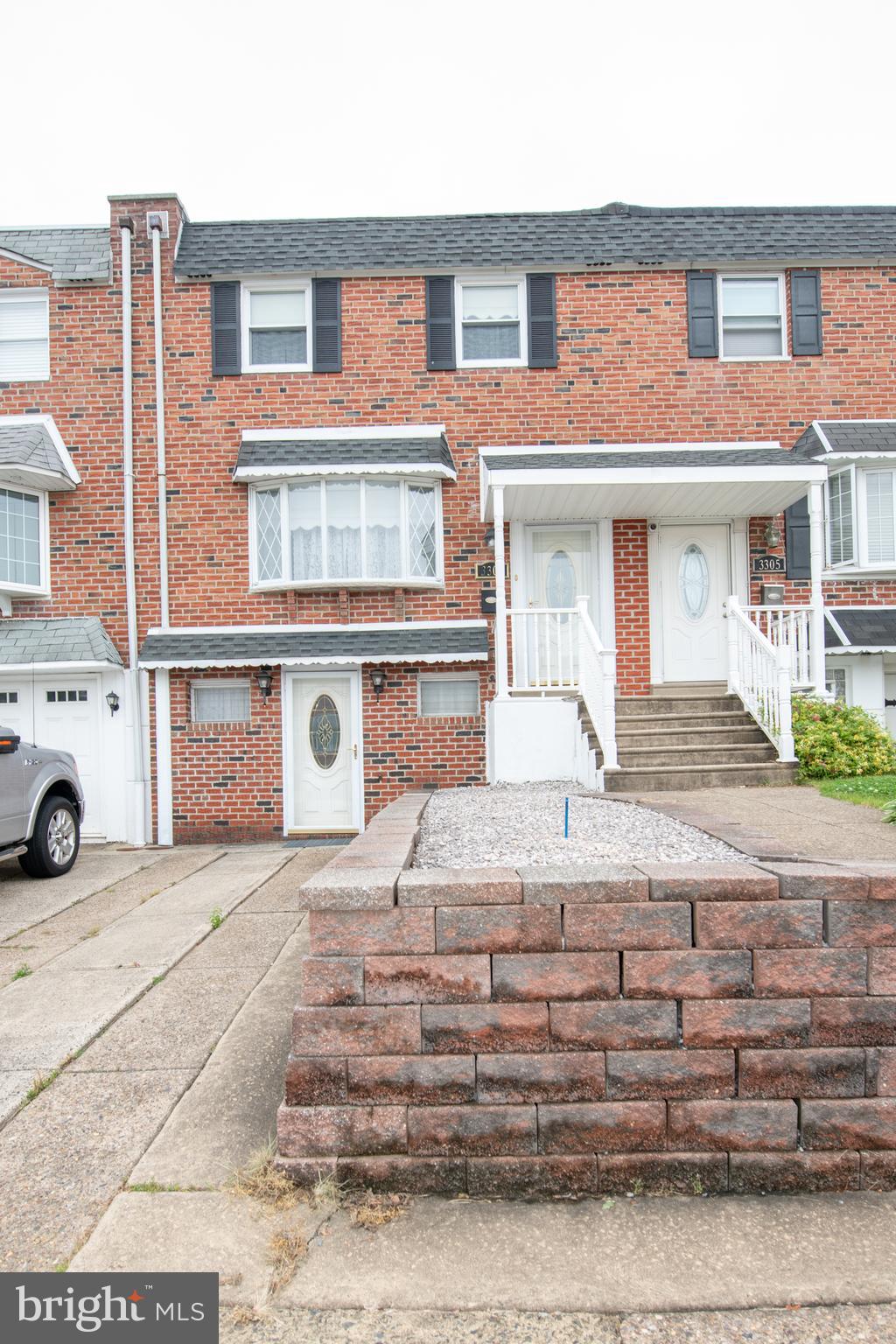 3303 Gurley Road Philadelphia, PA 19154 - Photo 3 of 32 a white building with a outdoor space