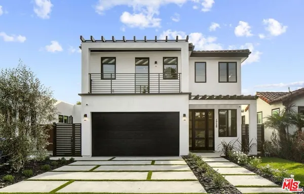 a view of a house with a garage