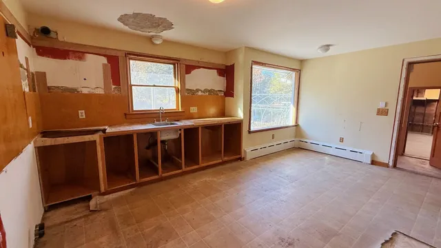 an empty room with windows