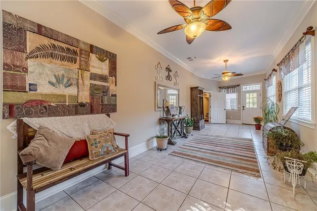 a view of a livingroom with furniture and window