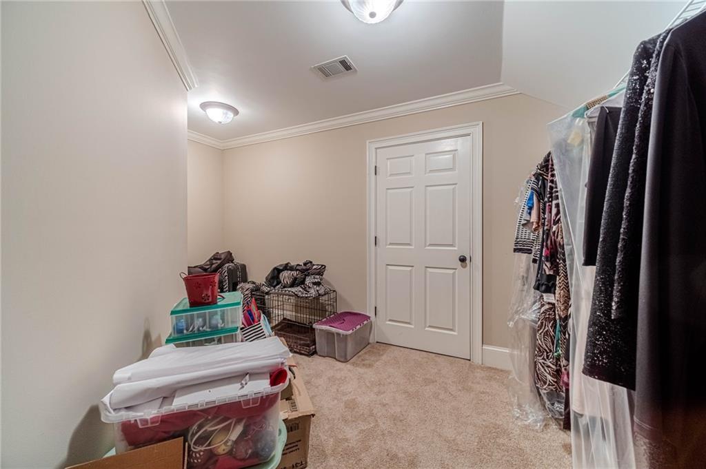 686 Newton Factory Bridge Road Covington, GA 30014 - Photo 41 of 110 a room with furniture and a window