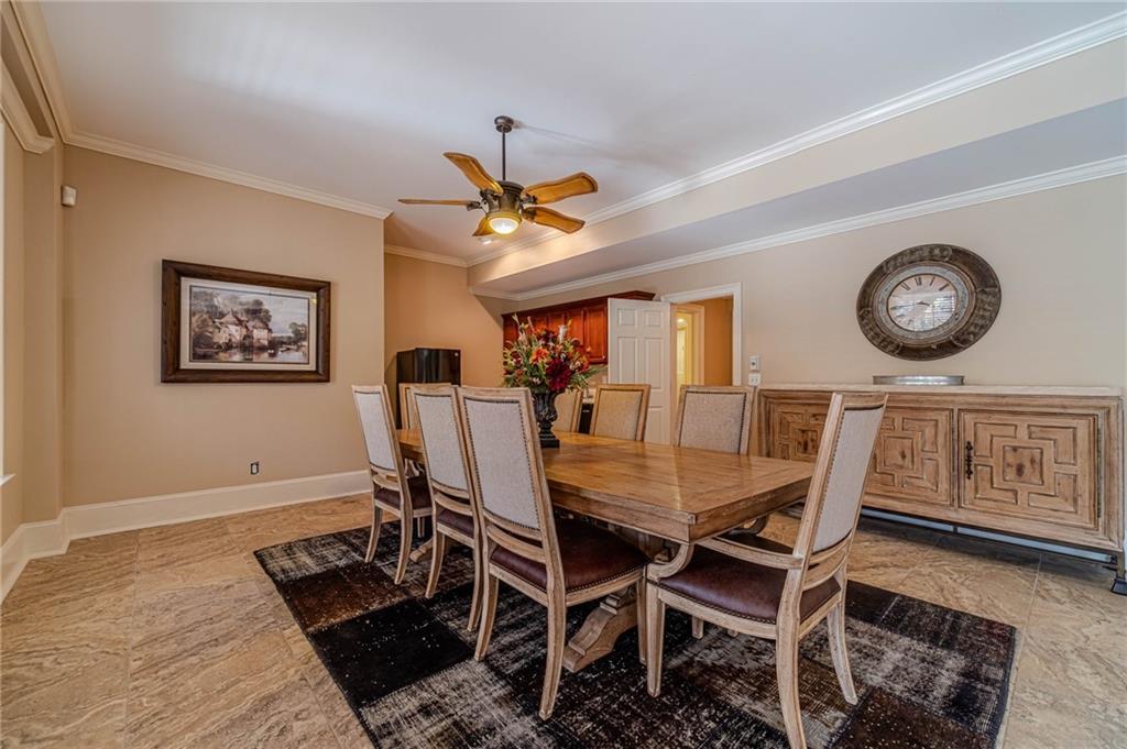 686 Newton Factory Bridge Road Covington, GA 30014 - Photo 54 of 110 a view of a dining room with furniture and a table