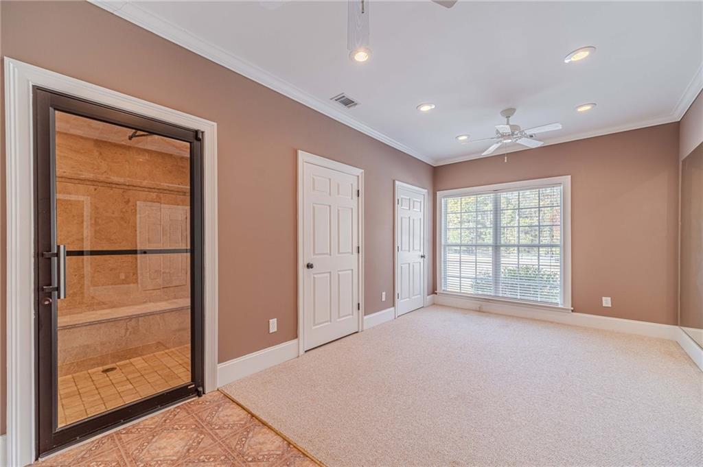 686 Newton Factory Bridge Road Covington, GA 30014 - Photo 73 of 110 a view of an empty room with a window