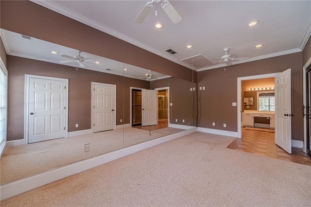 686 Newton Factory Bridge Road Covington, GA 30014 - Photo 74 of 110 a view of an empty room with closet area