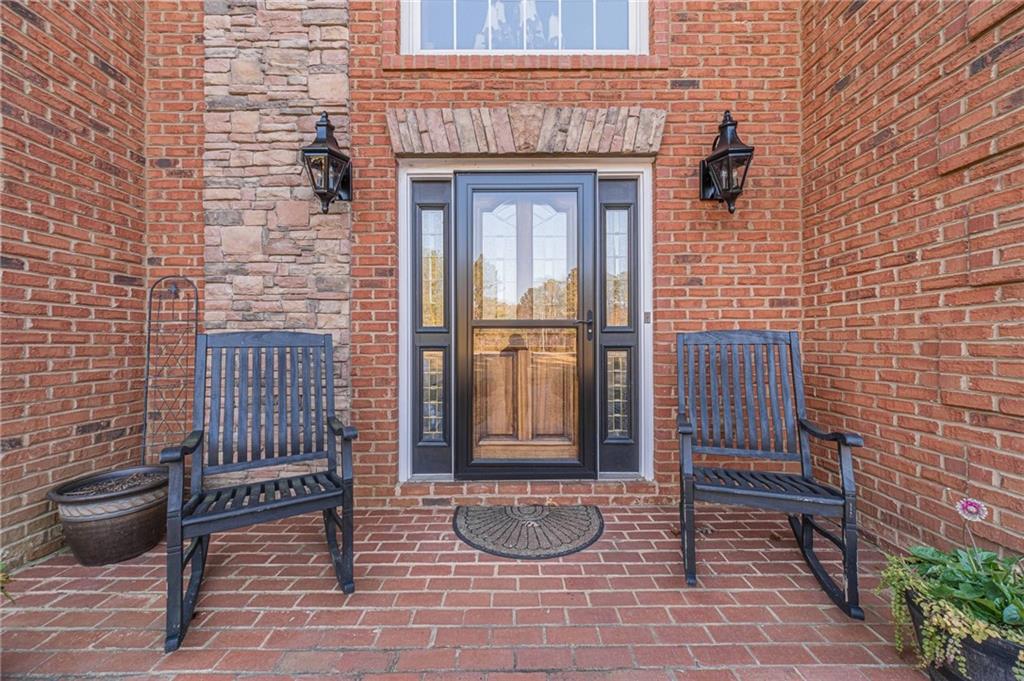 686 Newton Factory Bridge Road Covington, GA 30014 - Photo 9 of 110 a view of a door and chair and door