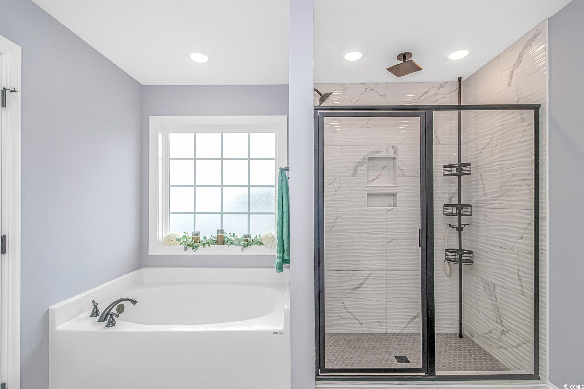4082 Edwards Road Aynor, SC 29511 - Photo 23 of 40 Full bath featuring a stall shower, a bath, and recessed lighting